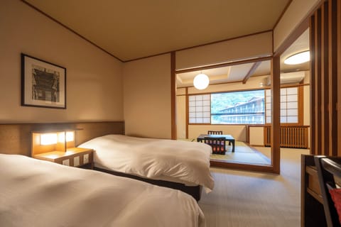 Japanese-Western Style Room for 4 people, Non Smoking | Individually furnished, desk, free WiFi, bed sheets