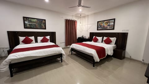 Deluxe Quadruple Room, 2 Double Beds, City View | Premium bedding, pillowtop beds, individually furnished, desk