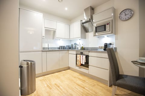 Apartment | Private kitchen | Full-size fridge, microwave, oven, stovetop