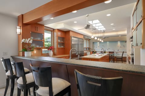 Savor a delightful break in the luxurious kitchen with a fragrant cup of coffee or delectable pastries.