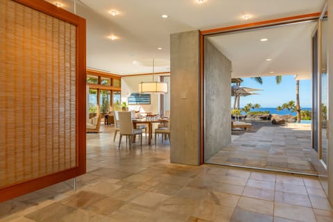 As you step into the foyer, make your way to the enchanting pool, where you can fully embrace the breathtaking beauty of your surroundings.