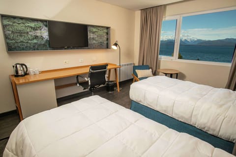 Room, 1 King Bed, Lake View | Minibar, in-room safe, desk, laptop workspace