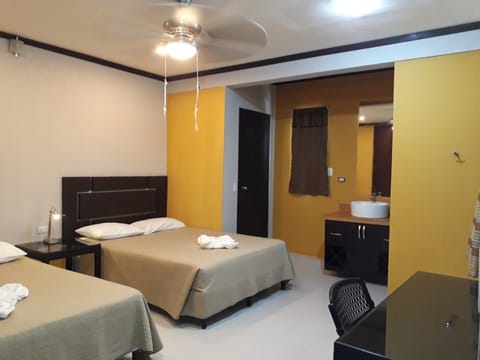 Deluxe Double Room, Multiple Beds, Non Smoking | In-room safe, individually furnished, desk, laptop workspace