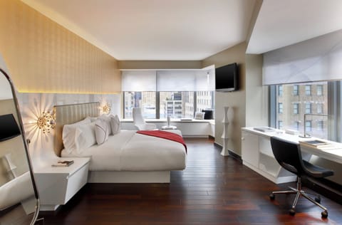 Deluxe Suite, 1 King Bed, City View | Hypo-allergenic bedding, in-room safe, desk, laptop workspace