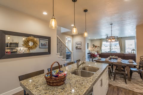 Kitchen Island - The Kitchen Island comfortably seats 4 adults and creates a great space for serving and preparing meals.
