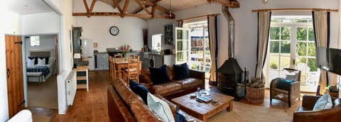 Ground floor: Spacious open plan living space with 3 ensuite bedrooms