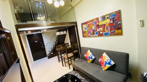 Family Loft | Living area | Flat-screen TV