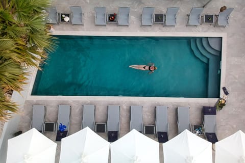 Outdoor pool, pool umbrellas, sun loungers