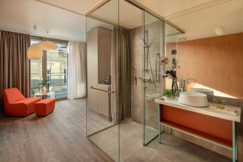 Junior Suite, Balcony | Memory foam beds, minibar, in-room safe, individually decorated