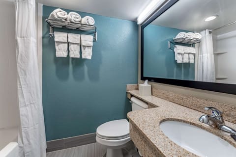 Standard Room, 2 Queen Beds, Non Smoking | Bathroom | Combined shower/tub, free toiletries, hair dryer, towels