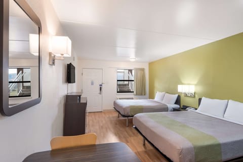 Deluxe Room, 2 Queen Beds, Non Smoking, Kitchenette | Desk, laptop workspace, blackout drapes, iron/ironing board