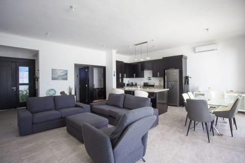 Comfort Villa, Pool View | Living area | Smart TV