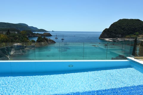 Seasonal outdoor pool, pool umbrellas, sun loungers