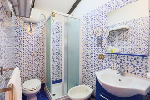 Family Apartment, 1 Bedroom | Bathroom | Shower, rainfall showerhead, free toiletries, hair dryer