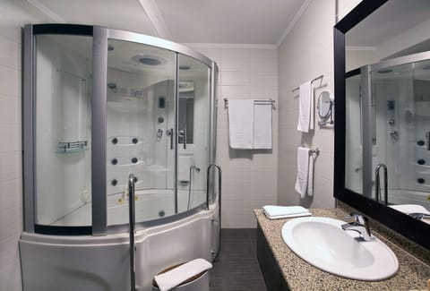 Suite | Bathroom | Hair dryer, bathrobes, slippers, towels