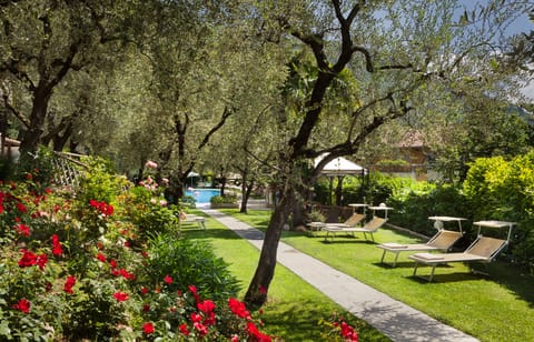 Indoor pool, seasonal outdoor pool, pool umbrellas, sun loungers