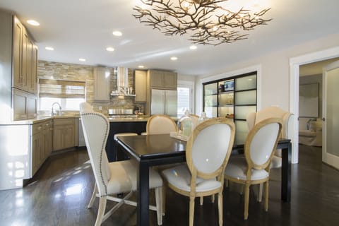 Glass Pantry doors where dishes are kept plus a small TV