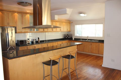 Family Apartment | Private kitchen | Oven, stovetop, toaster, coffee grinder