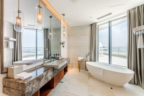 Suite, Multiple Beds, Non Smoking, Bay View (Yuzhou Bay View Suite) | Bathroom | Rainfall showerhead, hair dryer, bathrobes, slippers