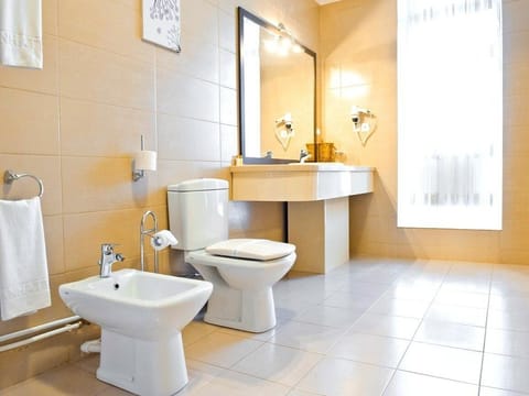 Presidential Suite, City View | Bathroom | Separate tub and shower, hair dryer, slippers, bidet