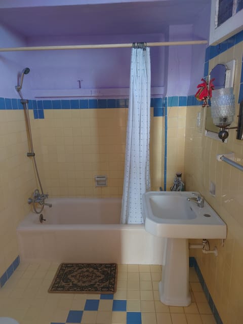 Family Quadruple Room, Multiple Beds, Non Smoking, City View | Bathroom | Combined shower/tub, deep soaking tub, rainfall showerhead, hair dryer