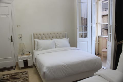 Family Triple Room | Premium bedding, down comforters, pillowtop beds, minibar