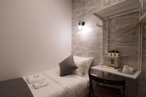 Standard Single Room, No Windows | In-room safe, desk, blackout drapes, free WiFi