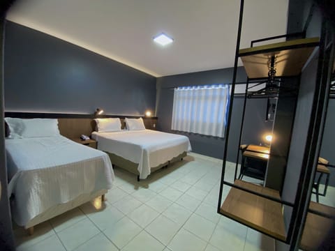 Triple Room, Non Smoking | Minibar, free WiFi, bed sheets