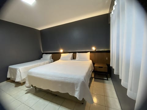 Triple Room, Non Smoking | Minibar, free WiFi, bed sheets