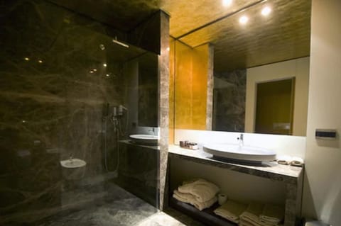 Luxury Suite, City View | Bathroom | Separate tub and shower, hair dryer, bidet, towels