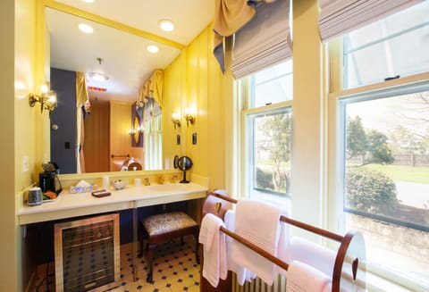 Suite, 1 King Bed (Water View) | Bathroom | Designer toiletries, hair dryer, towels, soap
