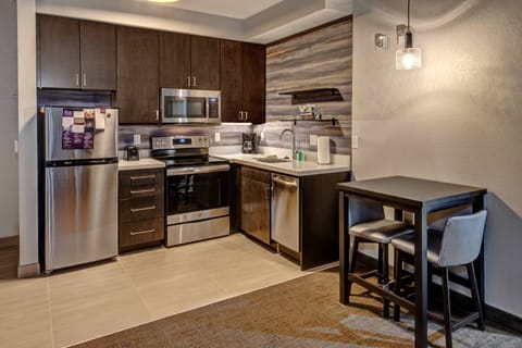 Suite, 1 Bedroom | Private kitchen | Full-size fridge, microwave, oven, stovetop