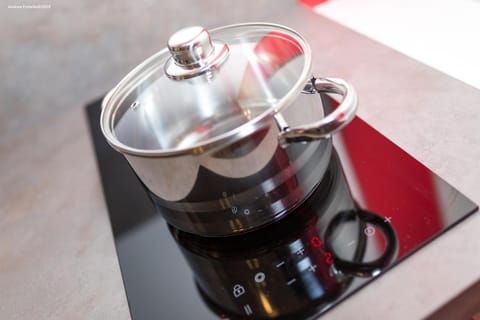 Full-size fridge, microwave, stovetop, coffee/tea maker