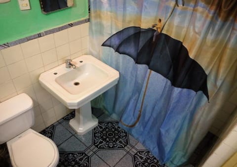 Comfort Quadruple Room, 2 Queen Beds, Non Smoking, Garden View | Bathroom | Shower, rainfall showerhead, free toiletries, towels