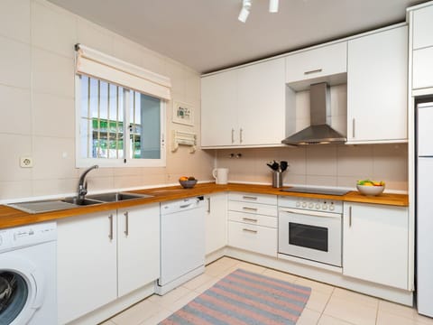 Property, Room, Kitchen, Cabinetry, Furniture, Countertop, Yellow, Interior Design, Building, Real Estate