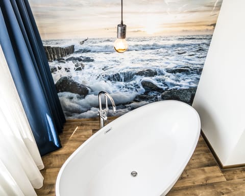 Suite | In-room safe, individually decorated, desk, blackout drapes