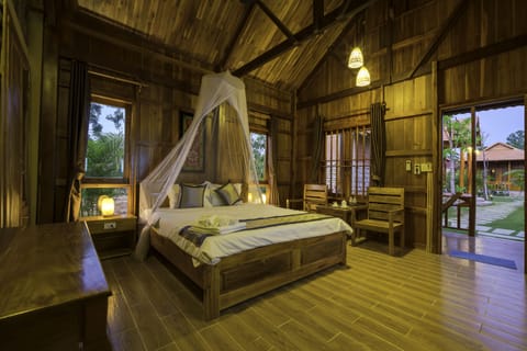 Deluxe Chalet, Pool View | Premium bedding, minibar, desk, laptop workspace