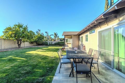 Enjoy this gorgeous fenced in backyard and outdoor sitting area
