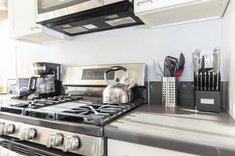Gourmet Kitchen with top of the line appliances and cooking utensils