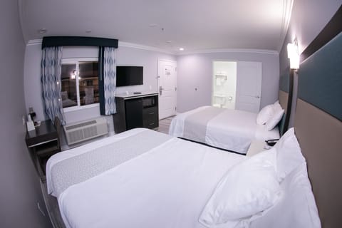 Room, 2 Queen Beds, Non Smoking | Desk, iron/ironing board, free WiFi, bed sheets