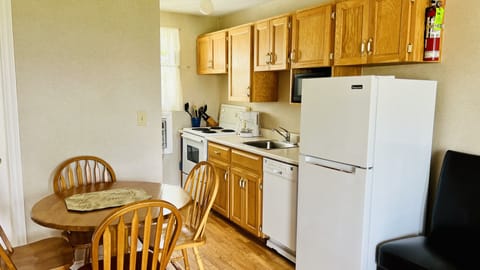 Luxury Apartment, Multiple Beds, Kitchen, Garden View | Private kitchen | Fridge, microwave, coffee/tea maker, highchair