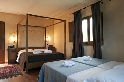 Quadruple Room | In-room safe, individually furnished, desk, blackout drapes