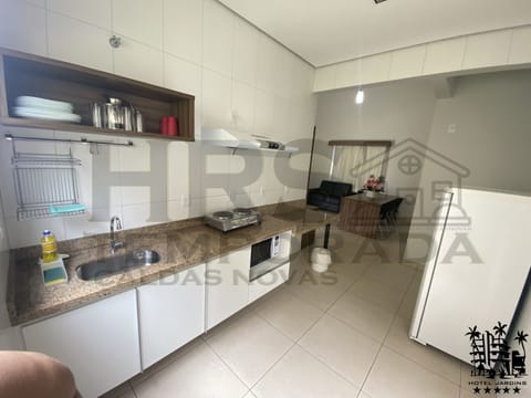 Deluxe Apartment, 3 Bedrooms, Garden View | Private kitchen | Fridge, microwave, oven, stovetop