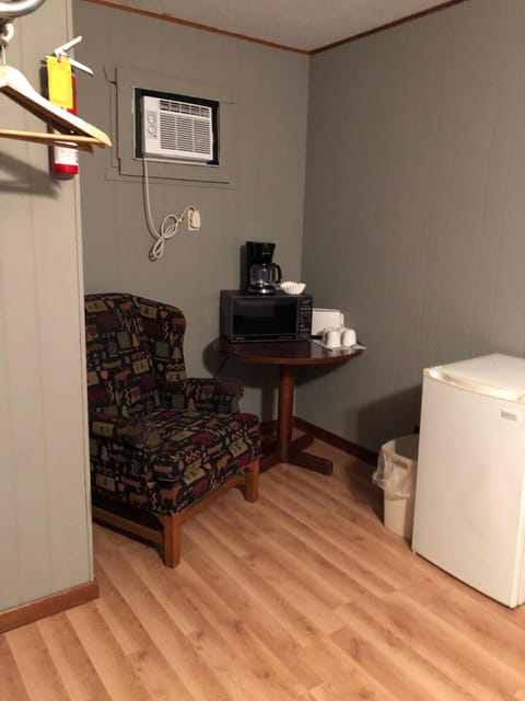 fridge, microwave and coffee pot.