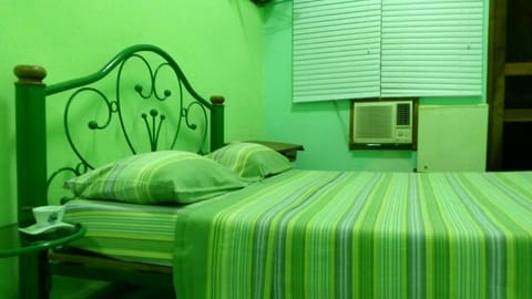 Classic Room, 1 King Bed, Smoking, Courtyard View | Minibar, in-room safe, individually decorated, desk