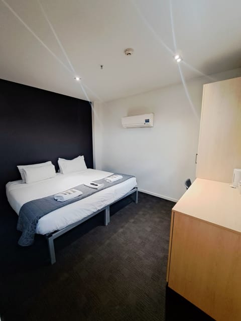 Combi/Twin Bunk Interior Room (Does Not Have Balcony) | Blackout drapes, iron/ironing board, free WiFi, bed sheets