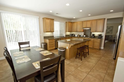 Breakfast nook adjoining kitchen with 6 person dining table