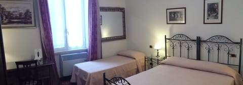 Superior Triple Room, Non Smoking | In-room safe, desk, blackout drapes, rollaway beds