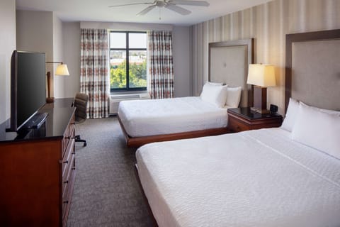 One bedroom suite two queens | Hypo-allergenic bedding, in-room safe, laptop workspace, blackout drapes