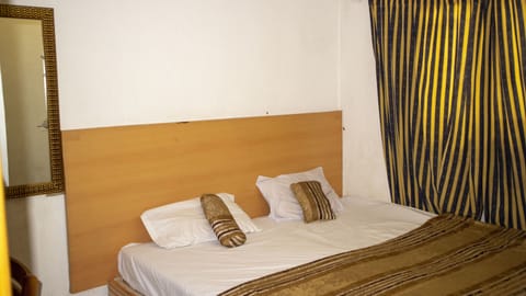 Standard Twin Room | 1 bedroom, blackout drapes, free WiFi, bed sheets
